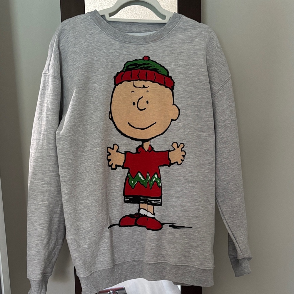Cozy Gray Sweatshirt with Festive Character Charlie Brown Design. Never worn.